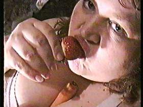 Snacking strawberry with golden shower