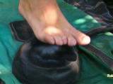 Rubber boat inflated barefoot with rubber pump