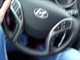 In the car driving a horny blonde gives a blowjob and swallows cum.