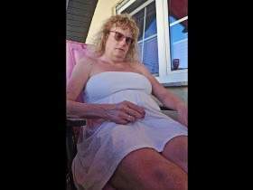 TSLillySophie squirts while relaxing on the balcony