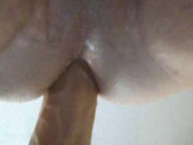 Close-up dildo fucking