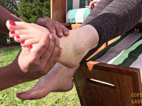 Foot massage outdoors