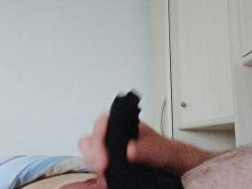 Horny jerking off in a black thong for the cock