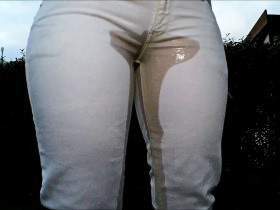 Pissing in the white pants while gardening