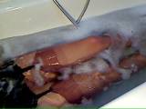 In the tub with nylons now it is HOT