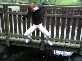 I piss on a wooden bridge