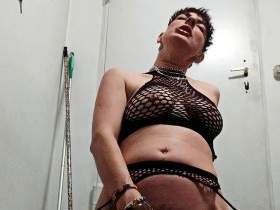 User gift: Large, colorful dildo, colorful socks and sexy fishnet outfit