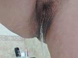 Hairy pussy of a black-haired girl