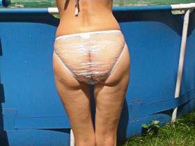In a transparent PVC bikini in the pool