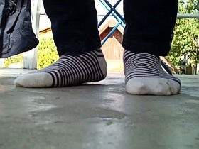 purple white socks on the balcony